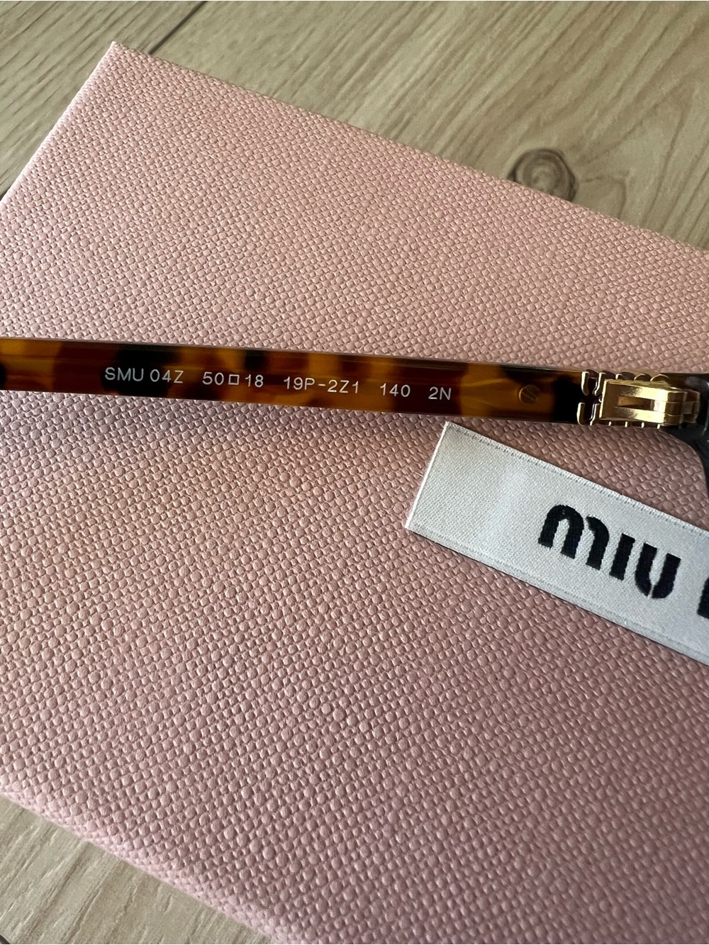 Miu Miu Tortoiseshell Oval Sunglasses with Brown Lenses - Picture 7 of 8